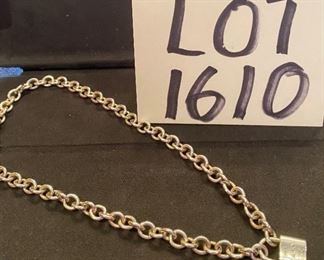 Lot 1610. Asking $325. Tiffany and Co. 1837 Padlock Necklace on 16" thick sterling chain with Original Box. Sterling Silver 925, Front of Padlock says 925 - T&Co, Authentic. Asking $325