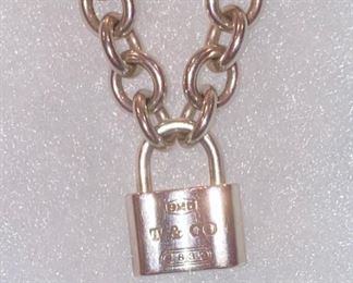 Lot 1610. Asking $325. Tiffany and Co. 1837 Padlock Necklace on 16" thick sterling chain with Original Box. Sterling Silver 925, Front of Padlock says 925 - T&Co, Authentic. Asking $325