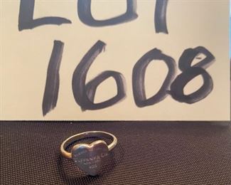 Lot 1608. $125.00. Tiffany & Co, Sterling Silver Heart Ring Size 6 - Heart says, "Please Return to Tiffany and Co., New York 925"