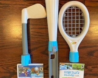 Lot 1646. $100.00 "The Wii Bundle": Wii Game Console, 2 Remote Controller, 2 Nunchucks, Mario Kart with 2 Wheels and Game, Wii Sports, Resort Sports Games and 2 Extra Battery Packs plus Nyko Battery Charger. $100.00"