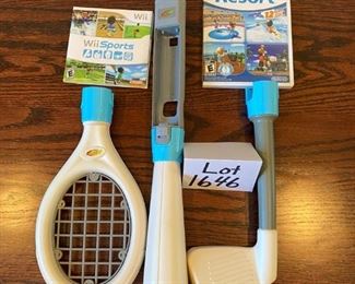 Lot 1646. $100.00 "The Wii Bundle": Wii Game Console, 2 Remote Controller, 2 Nunchucks, Mario Kart with 2 Wheels and Game, Wii Sports, Resort Sports Games and 2 Extra Battery Packs plus Nyko Battery Charger. $100.00"