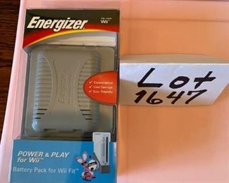 Lot 1647 $42.00 Wii Fit Board with Pink Skin, includes: Wii Fit. and Jillian Fitness Program. Bonus Energizer Battery Pack for the Wii Fit Board.