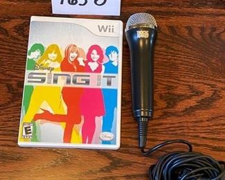 Lot 1650. $100.00. Wii Rock Band Drum Set and Game, Rock Band Microphone with Wii Sing Game, Rock Band Guitar with 3 Guitar Hero Games. Nice Lot!