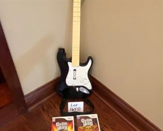 Lot 1650. $100.00. Wii Rock Band Drum Set and Game, Rock Band Microphone with Wii Sing Game, Rock Band Guitar with 3 Guitar Hero Games. Nice Lot!