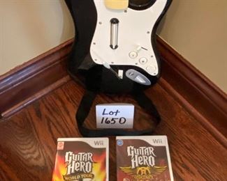 Lot 1650. $100.00. Wii Rock Band Drum Set and Game, Rock Band Microphone with Wii Sing Game, Rock Band Guitar with 3 Guitar Hero Games. Nice Lot!