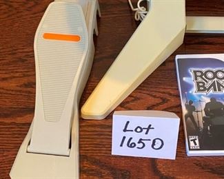 Lot 1650. $100.00. Wii Rock Band Drum Set and Game, Rock Band Microphone with Wii Sing Game, Rock Band Guitar with 3 Guitar Hero Games. Nice Lot!