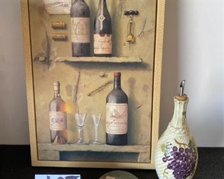 Lot 1653. $23. Wine Lovers Lot: Wine Print, LNT Olive Oil Cruet and 2 Wine Coasters. Print measures: 21.5" H x 13.5 W