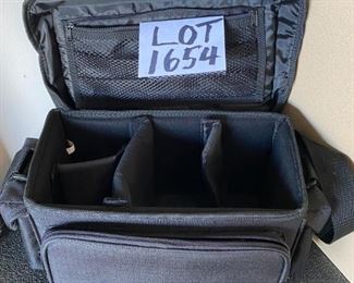 Lot 1654. $15. Nikon Camera Bag, great Shape with adjustable Compartments for Digital Camera.