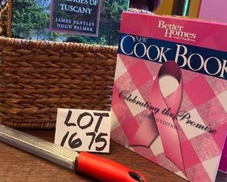 Lot 1675. $36. Woven Grass basket with Iron decorative handle, book "Most Beautiful Villages of Tuscany," Better Homes Breastt Cancer Cookbook, and a microplane for grating hard cheeses and other uses - like pedicures!!