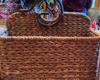Lot 1675. $36. Woven Grass basket with Iron decorative handle, book "Most Beautiful Villages of Tuscany," Better Homes Breast Cancer Cookbook, and a microplane for grating hard cheeses and other uses - like pedicures!!