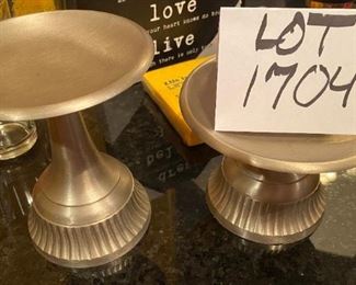 Lot 1704. $10. Two pedestal pillar candle plates