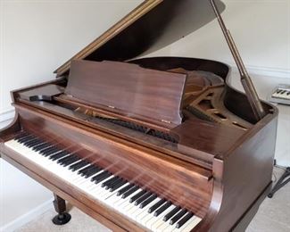 Baby Grand Piano. A great family home piano. Well made and inexpensive. Retails at around $1800.  Serial Number for this unit is 61777 and is believed to be manufactured around 1930. Bids accepted starting Tuesday morning