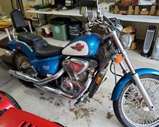 1994 Honda  VT600 CDR Shadow Deluxe. Has 1,391 Original Miles on it. Has been garage stored but not started for the last 15 years. Battery is dead and needs replacement. Will begin accepting bids on this motorcycle Tuesday morning  prior to sale opening on Thursday. Call, Text, or Come to the sale to bid.  Contact Dan to offer bid. 678-274-8824 