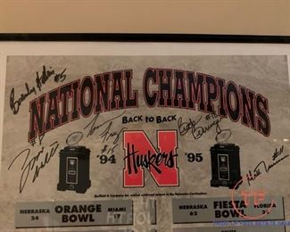 1994 and 1995 Back-To-Back Championship Framed Poster signed by BROOK BERRINGER, TOMMIE FRAZIER,  BRENDAN HOLBEIN, TYRONE WILLIAMS, and MATT TURMAN