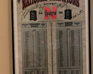 1994 and 1995 Back-To-Back Championship Framed Poster signed by BROOK BERRINGER, TOMMIE FRAZIER,  BRENDAN HOLBEIN, TYRONE WILLIAMS, and MATT TURMAN