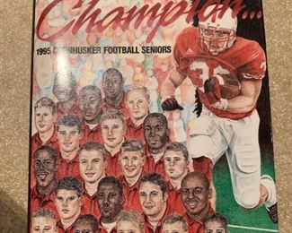 “Behind Every Champion” SIGNED by Nebraska Coaching Staff Including:  TOM OSBORNE, CHARLIE MCBRIDE, MILT TENOPIR, and MORE