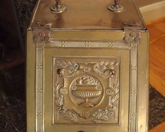Living Room:  This "Wilson & Sons" vintage brass coal box/skuttle has a slanted/hinged cover and lots of detail.  It does have its original removable liner and an attached  pocket in the back for the broom (which is MIA).  These also make interesting side "tables" next to a sofa.