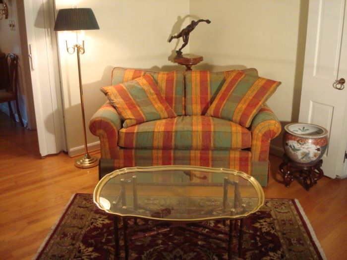 Living Room:  This quality CENTURY brand 64" love seat has two detached back cushions and one detached bench cushion as well as two matching toss pillows.  A classic brass "bugle" floor lamp with black shade is to the left, while a ceramic fish bowl on stand is on the right.  Closer photos of the other items follow.