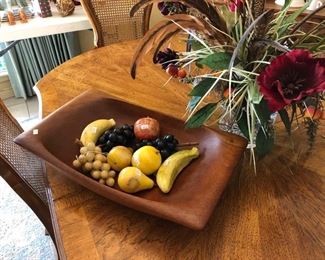 Beautiful wooden bowl with stone fruit