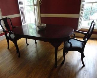 Table has padded cover and leaves. Only 2 chairs in this set. Hinkle Harris maker in Cherry wood