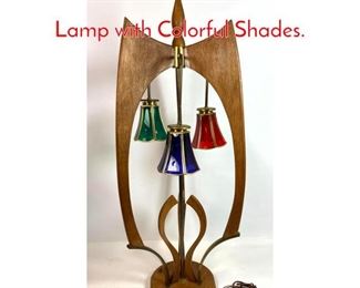 Lot 1209 50s Modern Walnut Table Lamp with Colorful Shades.