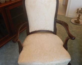One of the arm chairs for dining group