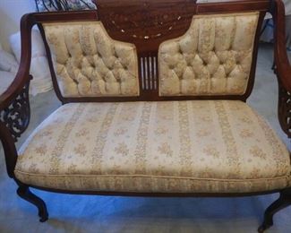 Continental settee with mother of pearl inlay