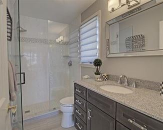 Fifth Ave master bath - great vanity & shower doors
