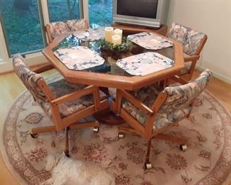 Octagon dining table with four chairs glass top