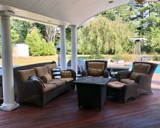 Patio set - brown wicker w/sofa, chairs & ottomans & coffee table & fire pit 