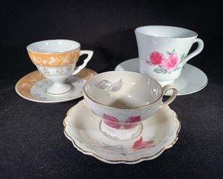 assorted tea cups and saucers