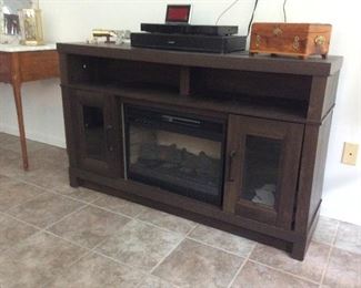 fireplace entertainment center. Very cool