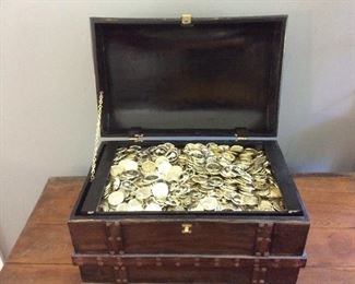 a box of toy coins