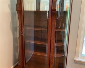 Very nice antique curved glass curio cabinet