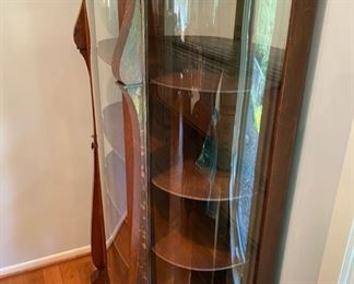 Very nice antique curved glass curio cabinet