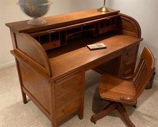 Antique 60” wide quarter sawn oak roll top desk and chair