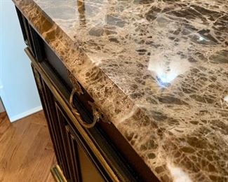 Close up of natural stone top on luxurious buffet by Henredon.