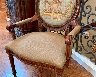 $450 - Luxurious armchair with chinoiserie scene. Measures 27” x 22” x 42”.