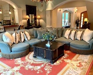 $7500 - GORGEOUS Blue Tufted-Back Sectional Sofa by Henredon. This is in EXCELLENT condition. The middle section measures 94” x 56” x 40”, the end sections measure 80” x 50” x 40”, and the ottoman measures 33” x 26” x 16”. Note: Rug is not for sale.