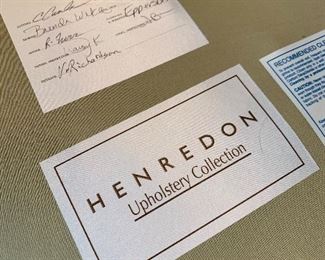 Close up of labels on Blue Tufted-Back Sectional Sofa by Henredon.