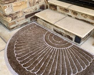 $20 - Crescent Shaped Outdoor Mat