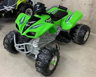 $100-Kawasaki XFX by Power Wheels. Measures 42"L x 29"W x 27"H.