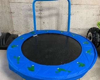 $30-Mini trampoline measures 49" in diameter.  Handle is 32" high. 