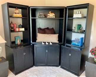 $550-Three piece shelving unit.  Side pieces measure 24"L x 23"W x 74"H. Middle section is 31"L x 23"W x 74"H.  Originally purchased for $1800.