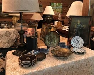 Fitz & Floyd plates, Jager plates, porcelain and brass trinket boxes, framed art, decorative brass plates, vintage table lamp, more