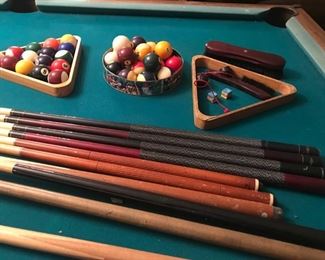 Close-up of Gandy pool table and accessories