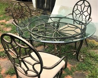 Glass outdoor table and matching chairs