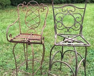 Two metal outdoor barstool/high top chairs