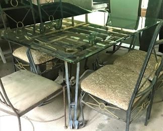 Large glass outdoor table with 6 chairs