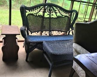 Decorative wicker sofa and matching table